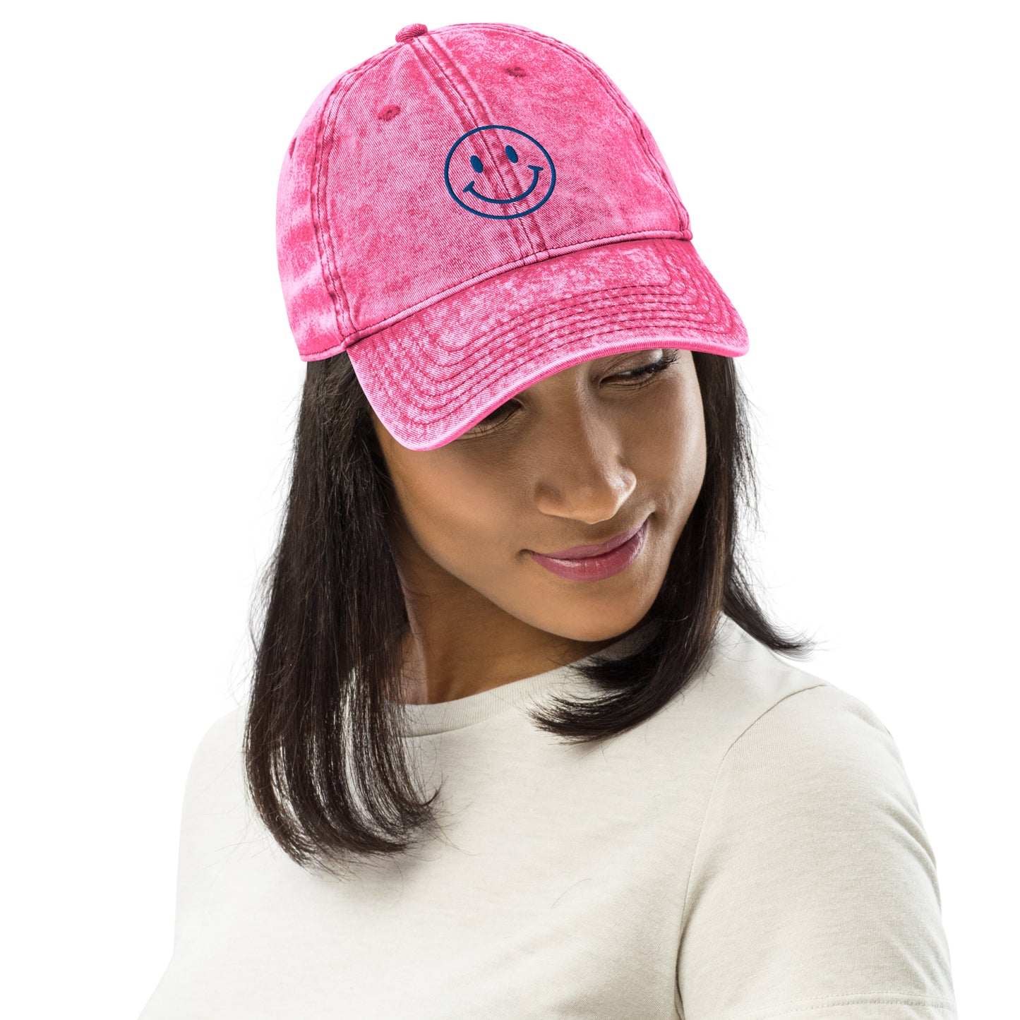 a woman wearing a pink hat and a pink hat 